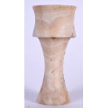 AN EGYPTIAN ALABASTER GOBLET TYPE VASE, formed with a tapering body and splayed base. 25.5 cm high.