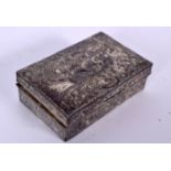 A JAPANESE WHITE METAL BOX DECORATED WITH A SHIP IN CHOPPY WATERS, “Made in Japan”. 7.75 cm wide.