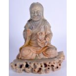 A 19TH CENTURY CHINESE CARVED SOAPSTONE FIGURE OF A BUDDHA Qing. 14 cm x 8 cm.