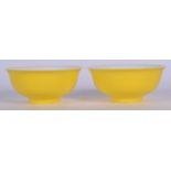 A PAIR OF CHINESE YELLOW GROUND PORCELAIN BOWL BEARING GUANGXU MARKS, formed with a flared rim. 10.