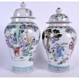 A NEAR PAIR OF CHINESE PORCELAIN VASE AND COVER BEARING KANGXI MARKS, decorated with the eight immo