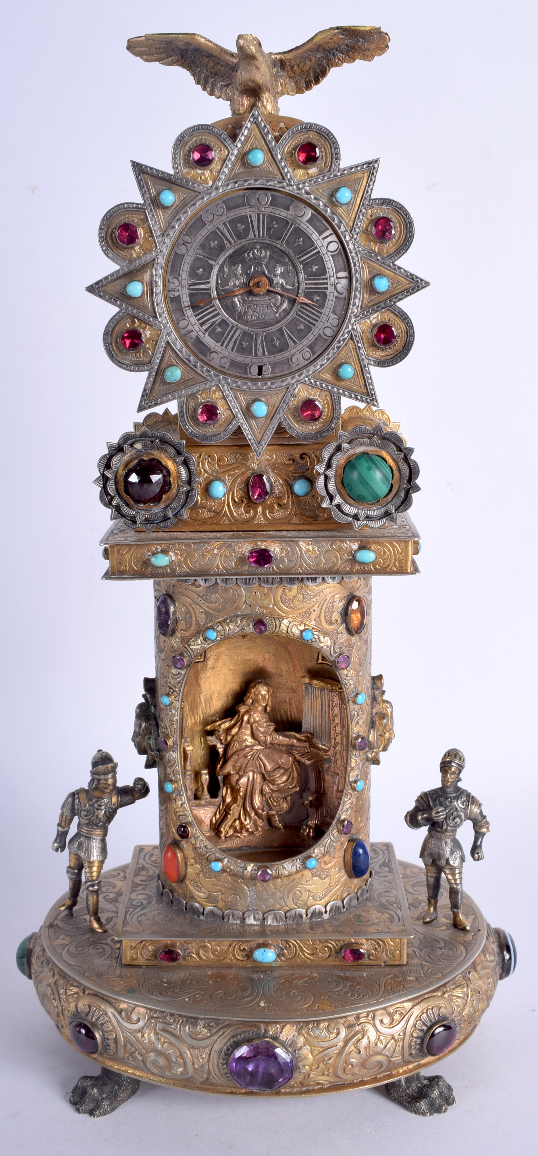 AN ANTIQUE AUSTRO HUNGARIAN SILVER GILT JEWELLED MANTEL CLOCK inset with malachite, garnets and tur