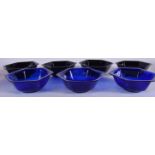 A SET OF FOUR BLACK CHINESE PEKING GLASS BOWLS, together with three blue bowls. 13 cm wide. (7)