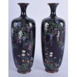 A GOOD PAIR OF EARLY 20TH CENTURY JAPANESE MEIJI PERIOD CLOISONNE ENAMEL VASES decorated with folia
