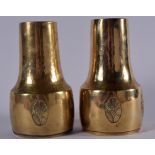 A PAIR OF WMF ART DECO BRASS VASES, formed with hammered necks and decorated with floral inspired p