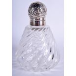 AN ANTIQUE SILVER AND GLASS SCENT BOTTLE. 15 cm high.