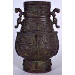 A LARGE CHINESE ARCHAIC STYLE BRONZE VASE, formed with twin handles. 30 cm high.