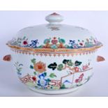 A LARGE 18TH CENTURY CHINESE EXPORT FAMILLE ROSE BOWL AND COVER Qianlong, painted with a fenced gar