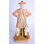 A ROYAL WORCESTER FIGURE OF THE SCOTSMAN FROM THE COUNTIES OF THE WORLD decorated in blush ivory da