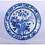 A 20TH CENTURY CHINES BLUE AND WHITE PORCELAIN DISH BERING YONGZHENG MARKS, decorated with flowerin