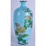 AN EARLY 20TH CENTURY JAPANESE MEIJI PERIOD CLOISONNE ENAMEL VASE with silver mounts. 12 cm high.