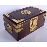 A LARGE CHINESE HARDWOOD BRASS BOUND BOX OR CASKET, formed with loop handles and incised with birds