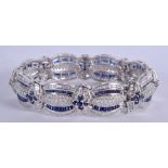 A FINE 18CT WHITE GOLD DIAMOND AND SAPPHIRE BRACELET by Van Cleef & Arpels, Paris, probably C1930.