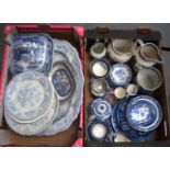 A LARGE QUANTITY OF ANTIQUE BLUE AND WHITE POTTERY, comprising of jugs, plates etc. (2 boxes)