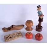 A VINTAGE NOVELTY BAVARIAN BLACK FOREST BOTTLE STOPPER together with unusual pottery toggles. (7)