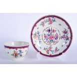 A 18TH CENTURY WORCESTER TEA BOWL AND SAUCER painted companie des indes style with flowers in a cir