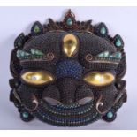 A RARE 19TH CENTURY NEPALESE TIBETAN TURQUOISE AND CORAL MASK inset with bone, lapis lazuli and gar