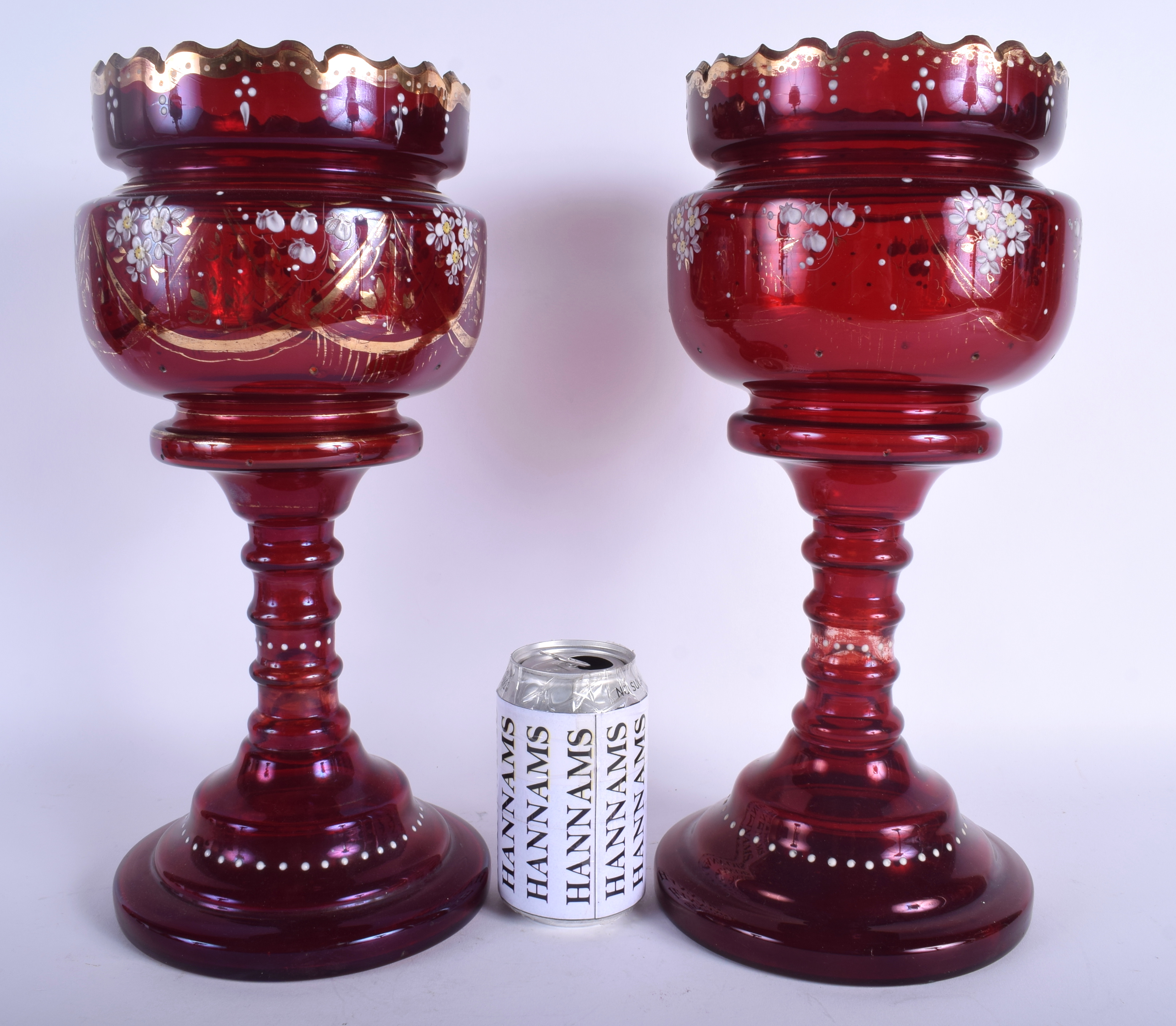 A PAIR OF ANTIQUE BOHEMIAN CRANBERRY GLASS LUSTRES. 36 cm high.