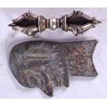 AN TIBETAN BRONZE PLAQUE, together with a white metal sceptre. 10 cm long. (2)