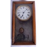 AN UNUSUAL CONTINENTAL OAK CASED ELECTRIC CLOCK. 24 cm x 48 cm.