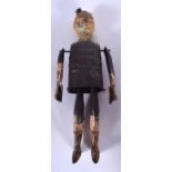 A CLOCKWORK TIN PLATE TOY FIGURE, formed as a male wearing a miniature hat. 23.5 cm high.