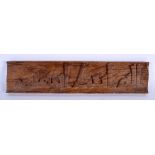 A CARVED MIDDLE EASTERN CALLIGRAPHY PANEL. 45 cm x 10 cm.