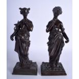 A PAIR OF 19TH CENTURY FRENCH BRONZE FIGURES OF FEMALES of classical form. 30 cm high.