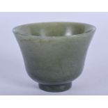 AN EARLY 20TH CENTURY CHINESE CARVED JADE TEA BOWL Late Qing. 5 cm wide.