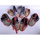 FOUR PAIRS OF TRIBAL VINTAGE NORTH AMERICAN BEAD WORK MOCCASINS. (8)