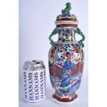 AN 18TH CENTURY CHINESE EXPORT BLUE AND WHITE VASE AND COVER Qianlong, with clobbered decoration. 2