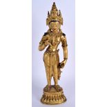 AN EARLY 20TH CENTURY CHINESE TIBETAN GILT BRONZE FIGURE OF A BUDDHA modelled standing holding a ph