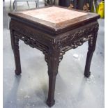 A 19TH CENTURY CHINESE HARDWOOD MARBLE INSET HARDWOOD STAND carved with foliage. 48 cm x 41 cm.