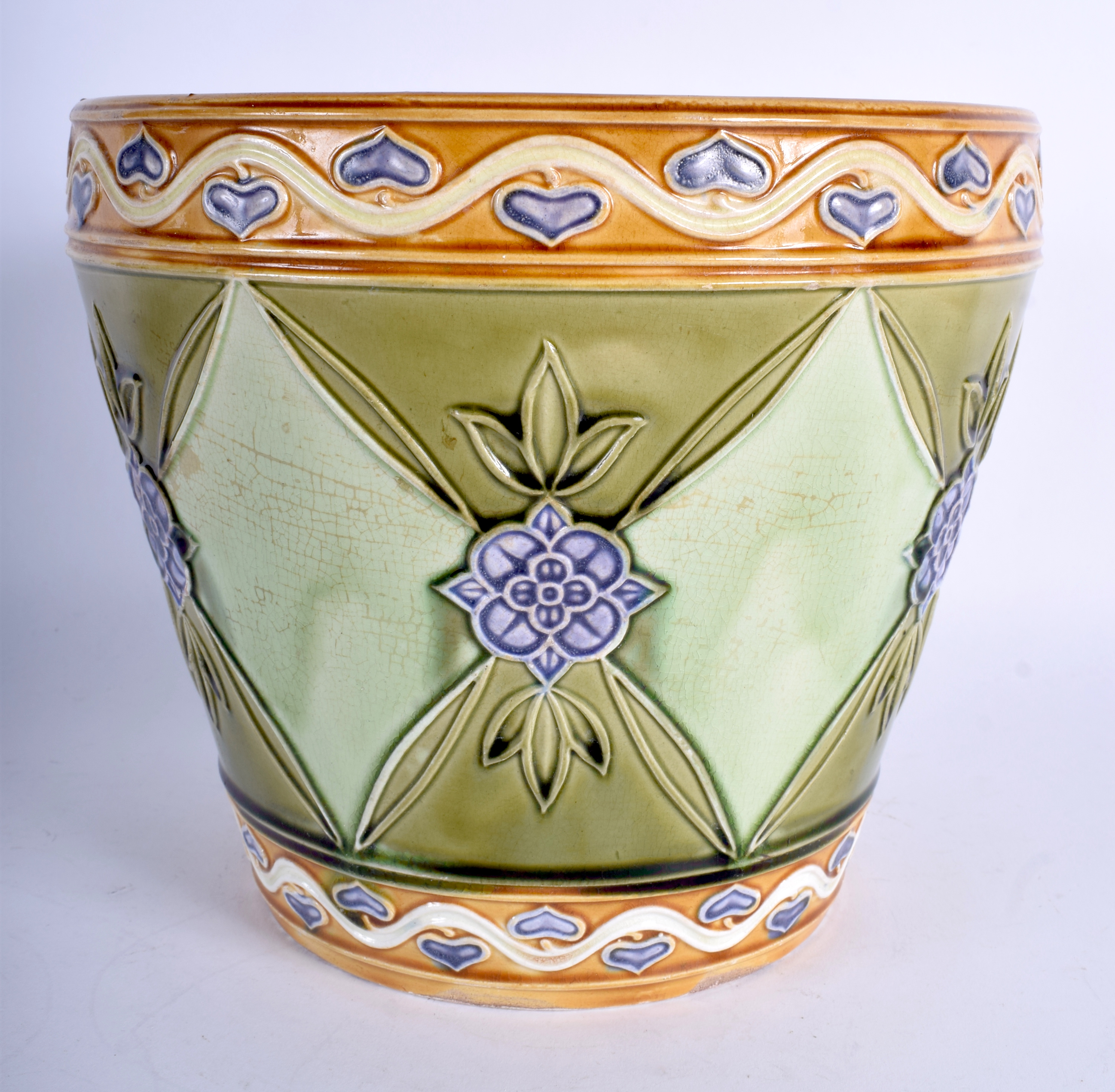 AN ART NOUVEAU MINTON POTTERY MAJOLICA JARDINIÈRE. 18 cm x 20 cm.