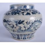 A LARGE CHINESE BLUE AND WHITE GUAN JARDINIERE Yuan style, painted with dragons amongst clouds. 30