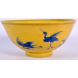 A CHINESE YELLOW GLAZED PORCELAIN BOWL BEARING CHENGHUA MARKS, painted with birds. 14.5 cm wide.