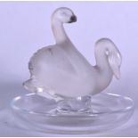 A LALIQUE GLASS SWAN PIN DISH, signed “Lalique France” to base. 9 cm x 9.5 cm.