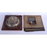 A RARE ANTIQUE ROULETTE SPINNING GAMING WHEEL with overlaid painted metal animals. 30 cm square.