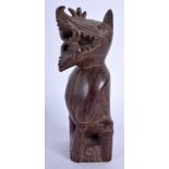 A RARE TRIBAL POLYNESIAN HAWAIIAN HARDWOOD FIGURE OF A BEAST modelled as a scowling hound. 15.5 cm