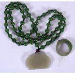 A CHINESE APPLE JADE SPHERICAL BEAD NECKLACE, formed with a pendant, together with a ring. Necklace