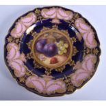 AN ANTIQUE ROYAL WORCESTER SCALLOPED PORCELAIN PLATE by Richard Seebright. 21.5 cm wide.