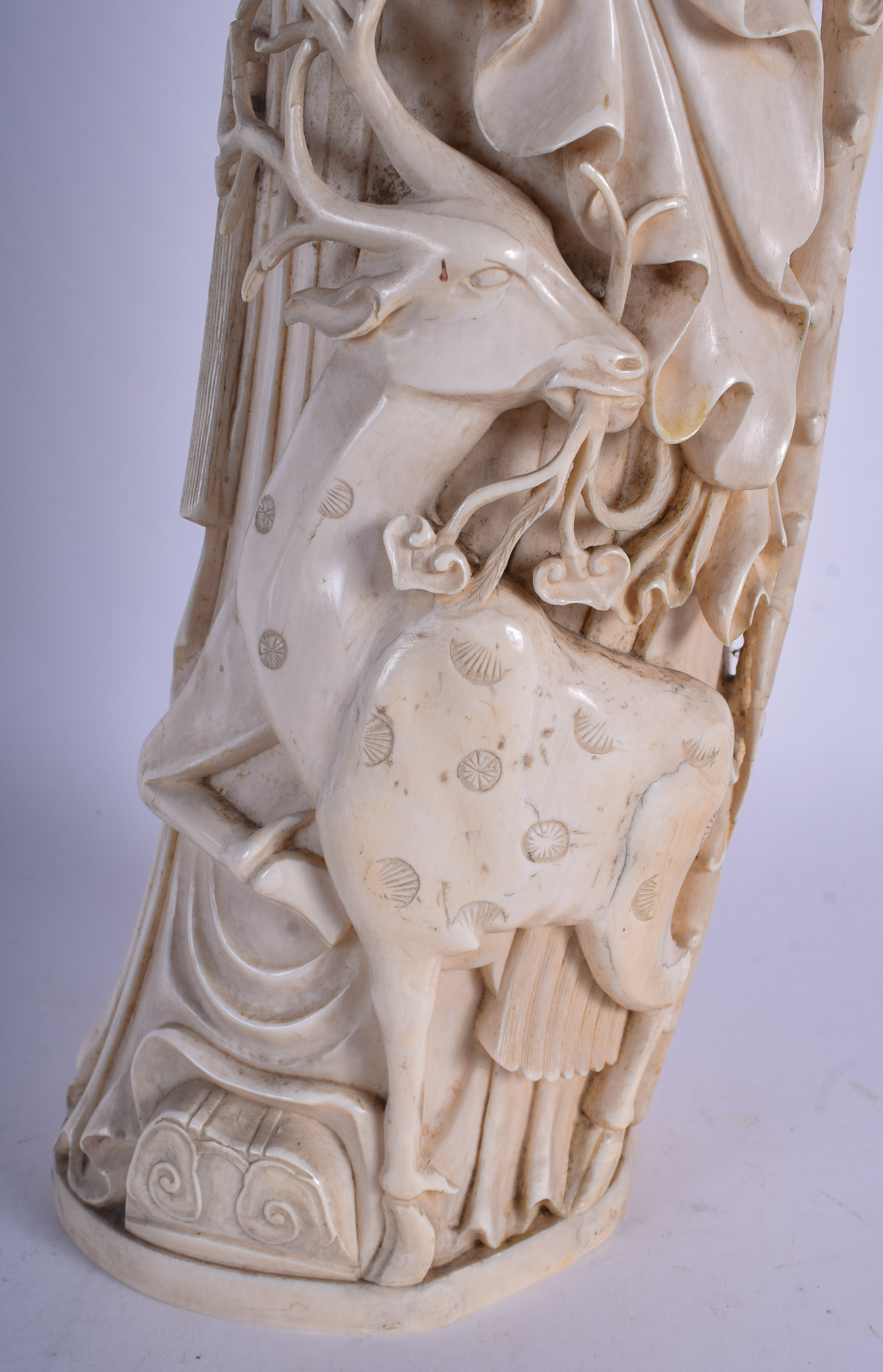 A VERY LARGE 19TH CENTURY CHINESE CARVED IVORY FIGURE OF SAGE Late Qing, modelled standing beside a - Image 4 of 7