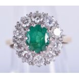 A MATCHING LARGE ANTIQUE GOLD DIAMOND AND EMERALD FANCY CLUSTER RING. 6.3 grams. L. Emerald 0.5 cm