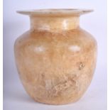 AN EARLY EGYPTIAN CARVED ALABASTER JAR of plain form. 17 cm x 13 cm.
