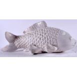 A LARGE CHINESE BLANC DE CHINE FIGURE OF A FISH, modelled with bold scales. 43 cm wide.