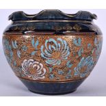 A DOULTON LAMBETH PORCELAIN JARDINIÈRE, formed a wavy rim and painted turquoise and gilt foliage. 2