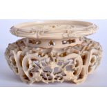 A MAJESTIC 18TH CENTURY CHINESE CARVED IVORY STAND Qianlong, carved with foliage and dragons. 8.5 c