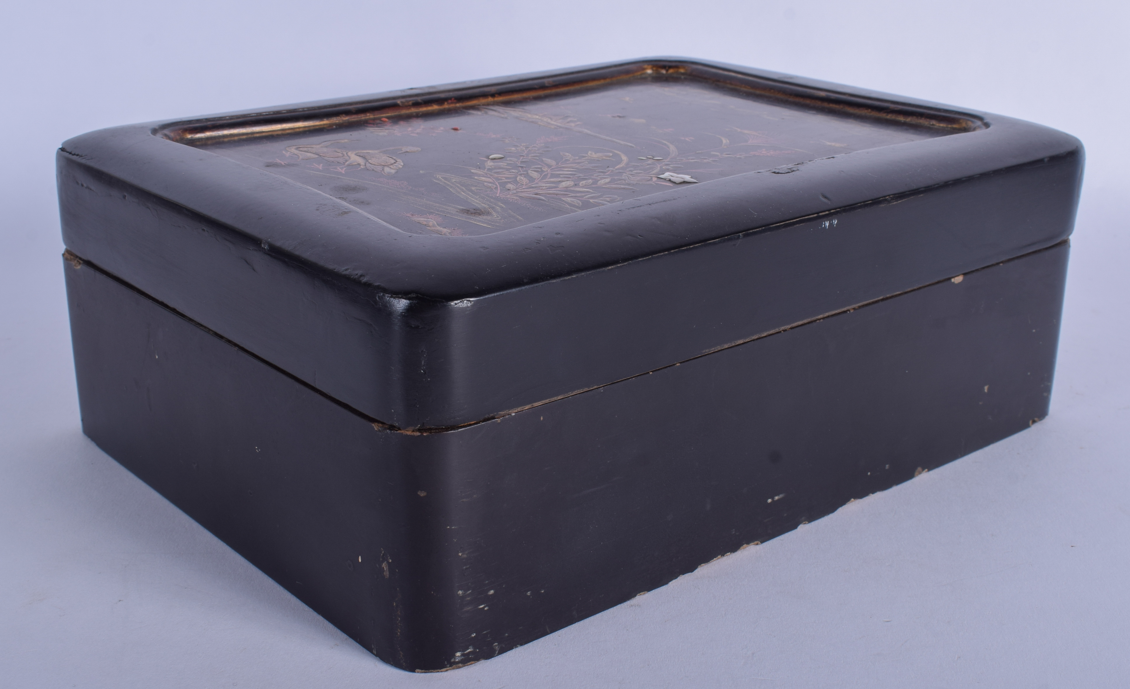A 19TH CENTURY JAPANESE BLACK LACQUER BOX AND COVER containing four lacquer boxes & covers. 19 cm x