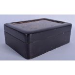 A 19TH CENTURY JAPANESE BLACK LACQUER BOX AND COVER containing four lacquer boxes & covers. 19 cm x