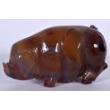 A CARVED AGATE FIGURE OF A PIG, modelled standing. 9 cm wide.