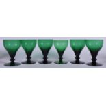 A SET OF SIX WILLIAM YEOWARD GREEN GLASSES, formed with a single knop stem. 14.25 cm high.